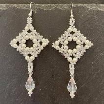 Tudor large drop earrings made form white pearls.