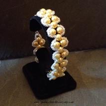 Right angle weave pearl bracelet with a seed bead lace edging.