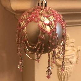 Pink and silver Arabian Nights bauble on a matt silver ball Christmas tree ornament.