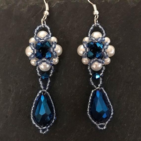 Blue and white Hulton Abbey earrings.
