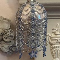 Beaded bauble cover made form blue and silver seed beads.