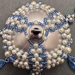 Blue and white Aphrodite bauble viewed from the top.