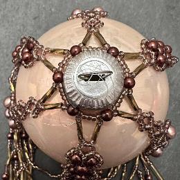 Top view of brown and gold bauble.