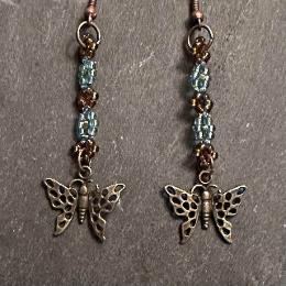 Seed bead earrings with bronze butterflies.
