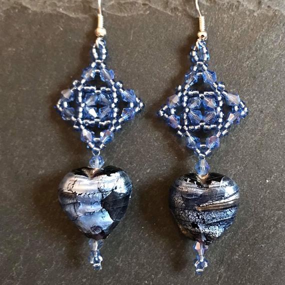Tudor Square earrings made with blue crystals and a large blue foil heart bead.