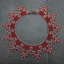 Hearts necklace made from red and gold seed beads.
