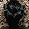 Megs Necklace. This is a set containing two necklaces with a matching bracelet and earrings.