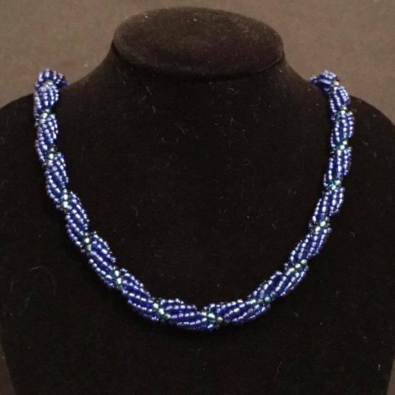 Necklace made from dark blue beads using the seed bead spiral rope pattern.