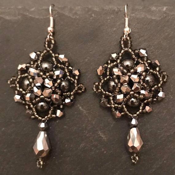 Persephone earrings made with silver crystals and grey beads.