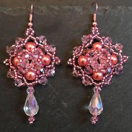 Persephone earrings made from pink pearls and crystals.