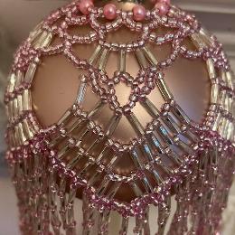 Chandelier bauble. Pink and silver beads on a pink Christmas tree ornament.