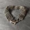 Photo of Steel Gate bracelet made from  steel grey bugles and seed beads.