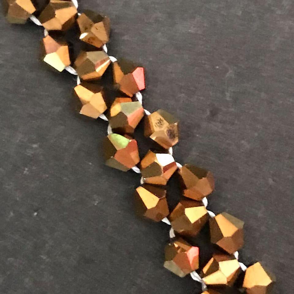 Right angle weave made with gold bicones.
