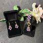 Purple pearl jewellery made using right angle weave.