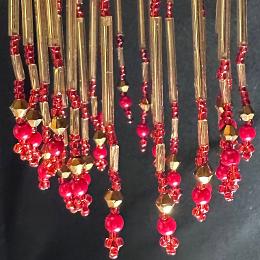 Red and gold beaded fringe.