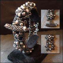 Pearl and crystal bracelet with a beaded toggle clasp.
