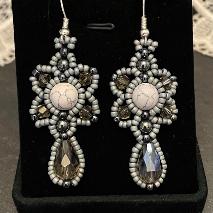 Starflower earrings made with semi precious stone beads and a crystal teardrop.