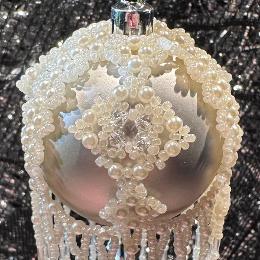 Close up of white bauble.